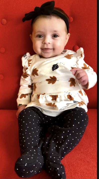Baby Luna looking picture perfect in a fall outfit.