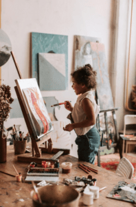Child Painting On A Canva