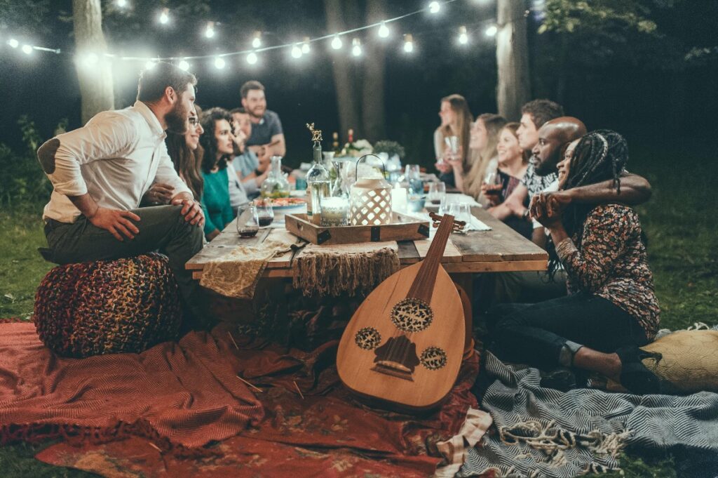 Group of Friends Surrounding Table During Holidays