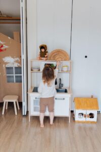 Child Playing With Montessori Toy