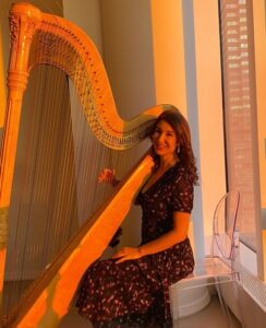Anita Rogers Playing The Harp
