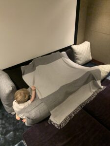 Child Building A Fort In Yacht