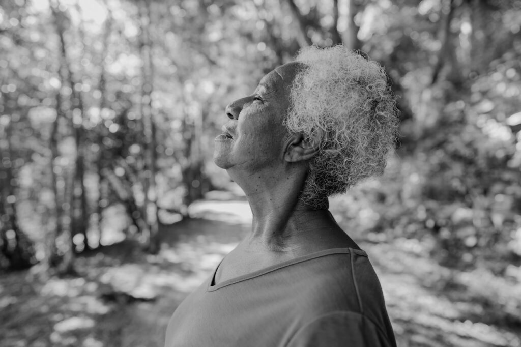 Senior Enjoying Quiet Moment Surrounded By Nature